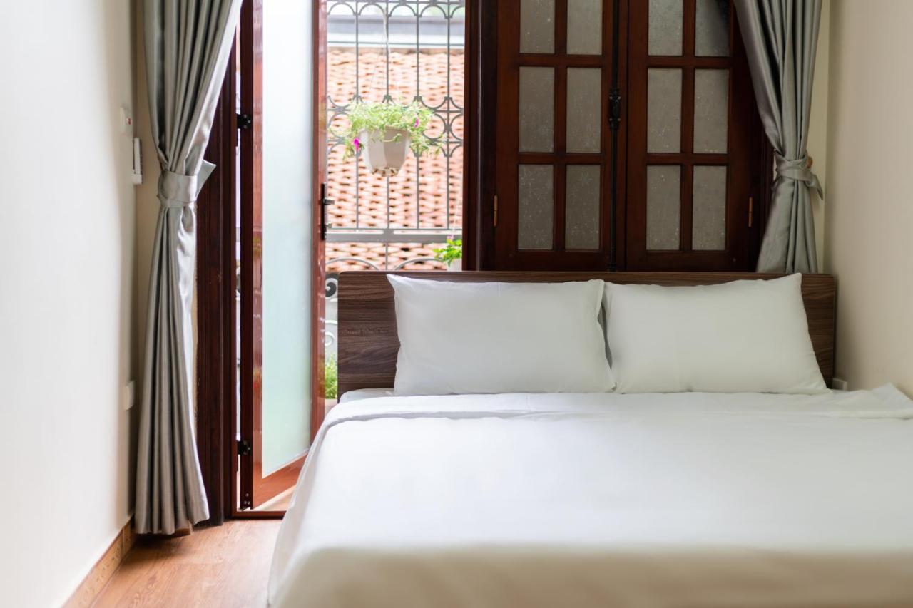 Nusmile'S Hostel And Travel Hanoi Buitenkant foto